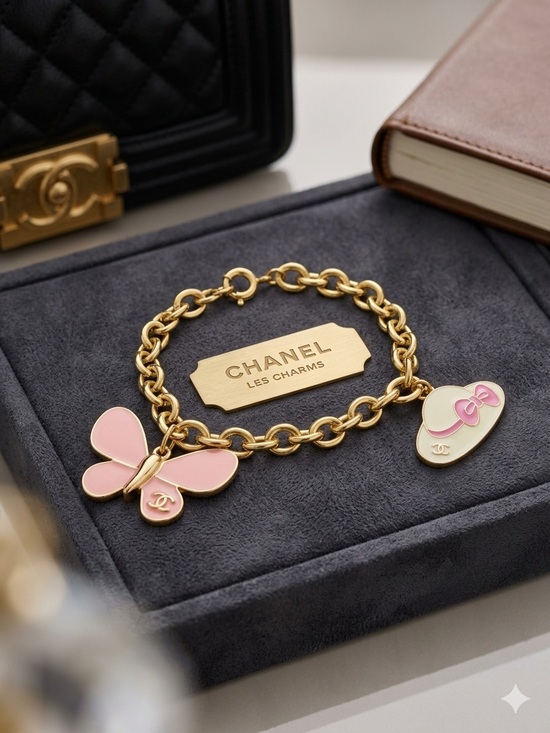 Chanel. Jewelry - ChaneI Les Charms Pink Enamel Butterfly & Hat Gold-Tone Bracelet